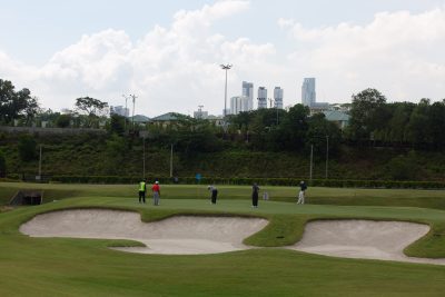 Green guarded by two large bunkers